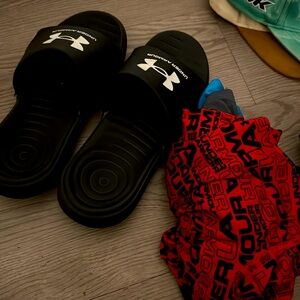 Box of boys size Medium underarmor clothes